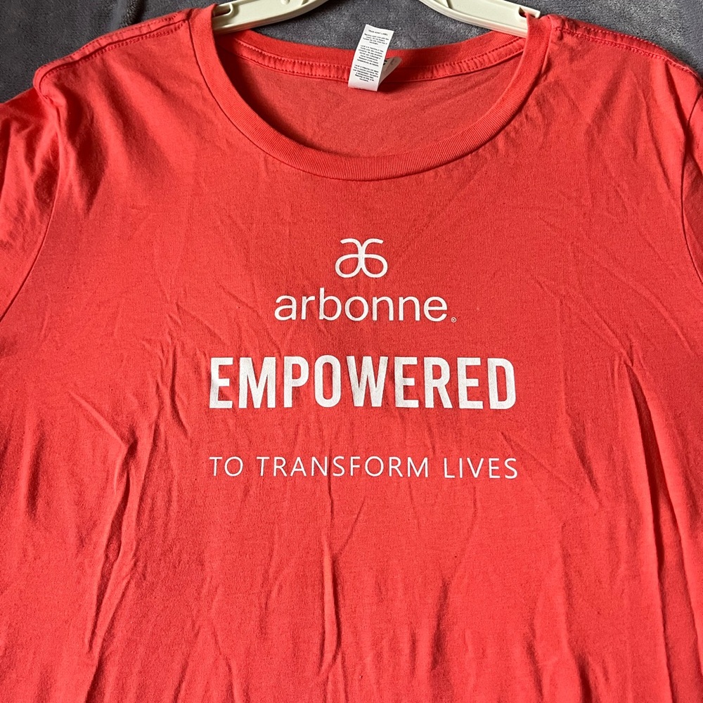 Arbonne Coral color Empowered Women's Tee